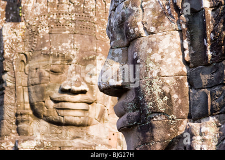 Two Enigmatic Face Towers forming part of The Bayon, Angkor Thom, Temples of Angkor, Cambodia, Indochina Stock Photo