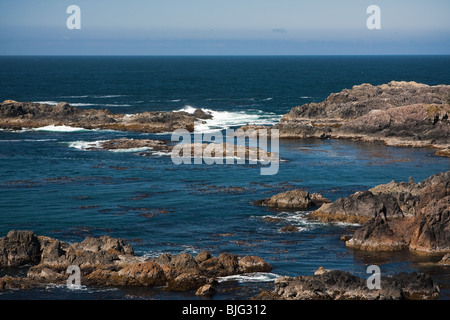 Waves breaking over the rocky coast of Vancouver Island, British Columbia Stock Photo