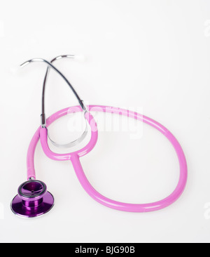 great image of a pink doctors stethoscope on white background Stock Photo