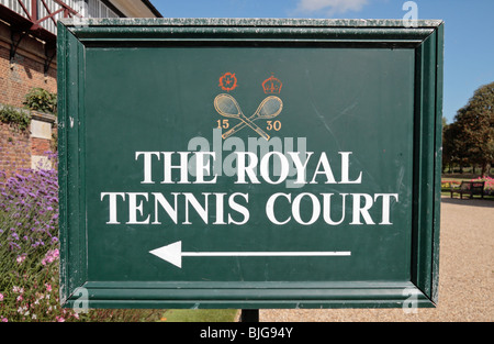 Sign pointing towards the Royal Tennis Court at Hampton Court Palace, Richmond Upon Thames, UK. Stock Photo
