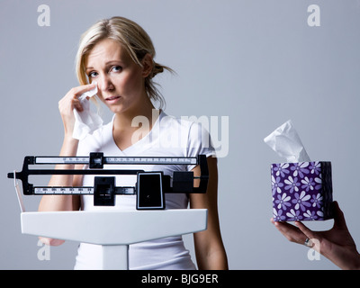 woman on a scale Stock Photo