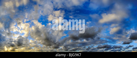 A view of panoramic sunset sky with colorful clouds Stock Photo