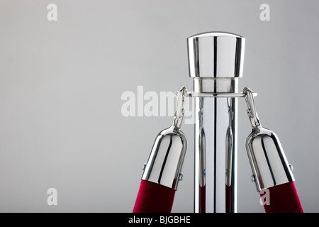 rope stand with a velvet rope attached Stock Photo