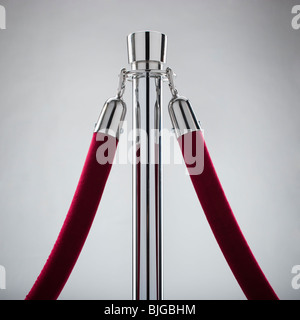 rope stand with a velvet rope attached Stock Photo