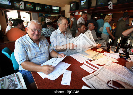 Men in a betting shop, Great Britain