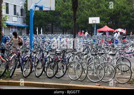 Bicycles for sale at start of semester on campus of Fudan University, Shanghai, China Stock Photo