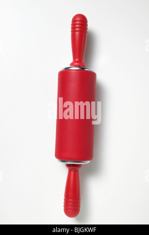 Red rolling pin - Stock Photo