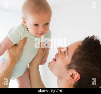 Father holding baby Stock Photo
