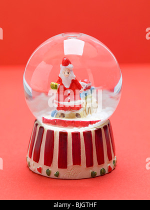 Christmas snow globe - Stock Photo