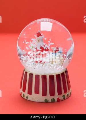 Christmas snow globe - Stock Photo