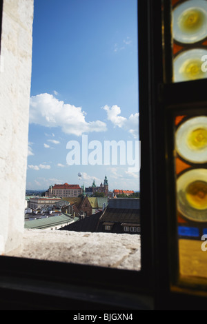 View of Wawel Castle through window of Town Hall Tower, Krakow, Poland Stock Photo