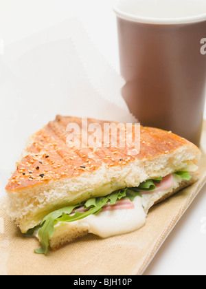 Cheese, ham and rocket in flatbread - Stock Photo