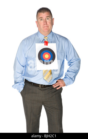 A businessman with a bulls eye target taped to his dress shirt. Stock Photo