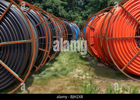 Spool of solid wall high density polyethylene (HDPE) conduit. Stock Photo