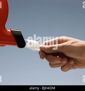 hand taking a number Stock Photo