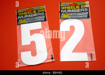 Two packs of wheelie bin numbers fifty two Stock Photo