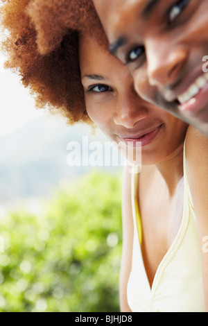 Couple relaxing outdoors Stock Photo