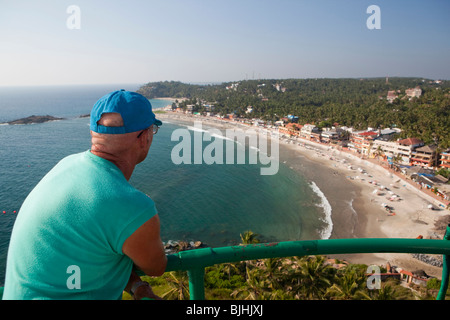 India, Kerala, Kovalam, tourist enjoying elevated view of beach from top of Vizhinjam Lighhouse Stock Photo