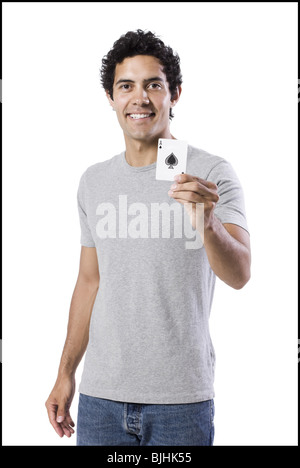 man holding an ace of spades Stock Photo