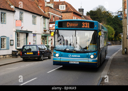 Arriva Bus 331 travelling through West Wycombe Village on it's way to Chinnor. Stock Photo