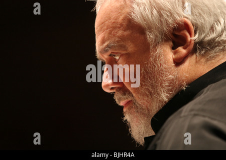 Conductor Gianluigi Gelmetti (in black) leads the Sydney Symphony Orchestra during music rehearsal at Osaka Symphony Hall, Japan Stock Photo