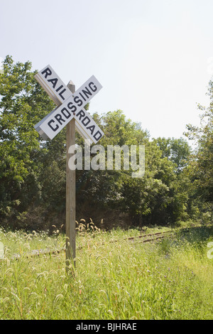 Railroad Crossing 2 tracks sign Stock Photo - Alamy