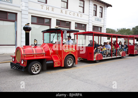 St. Augustine, FL - Jan 2009 - Sightseeing train guided tour vehicle carrying tourists through historic St. Augustine, Florida Stock Photo