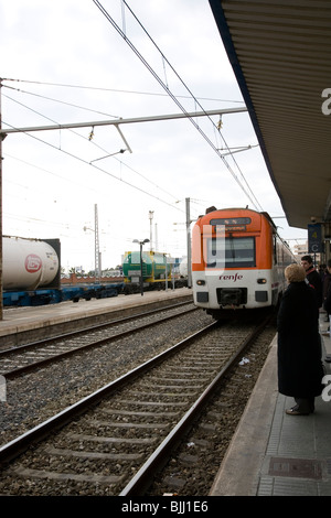 Renfe train arriving at Tarragona station in Spain Stock Photo