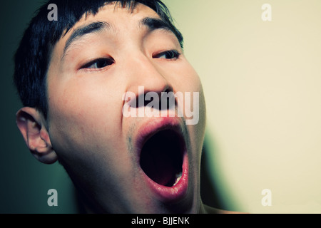 Obverse portrait of the shouting scared man, emotion Stock Photo