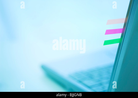 Laptop with color coded tabs Stock Photo