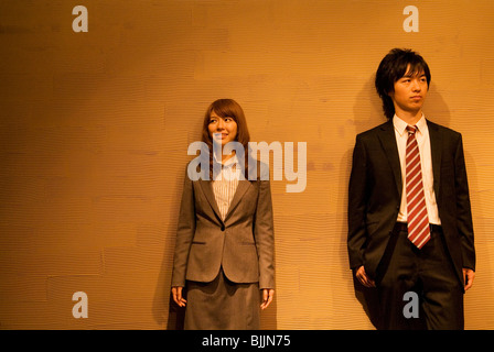 Two businesspeople standing side by side Stock Photo
