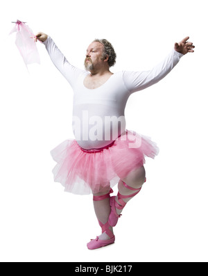 Overweight man in ballerina tutu smiling and dancing Stock Photo - Alamy