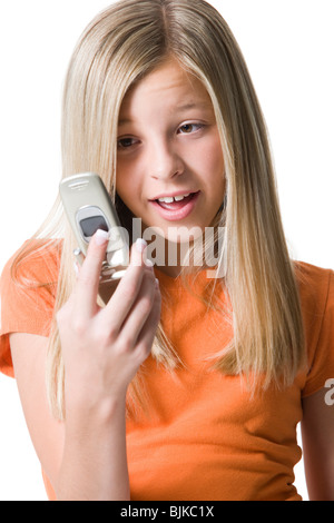 Girl looking at cell phone Stock Photo