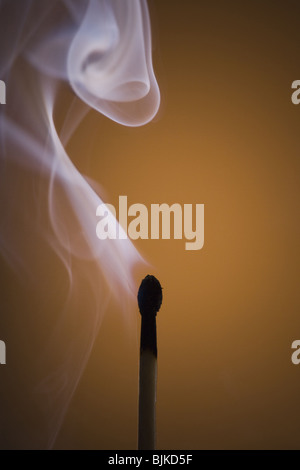 Smoking matchstick Stock Photo