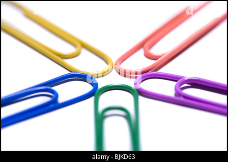 Multi coloured paperclips attached Stock Photo
