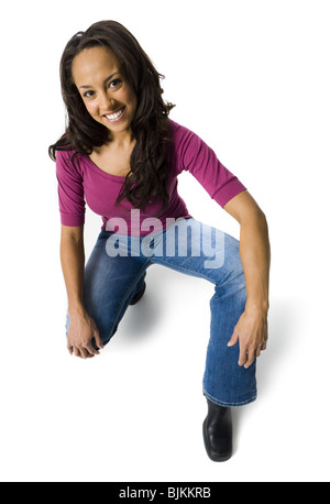Woman casually dressed looking up Stock Photo