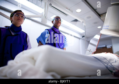 Aerial of woman undergoing x-ray in lab Stock Photo