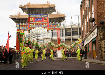 A dragon dance is held at the Chinese Gate as part of Chinese New Year celebrations in Newcastle-upon-Tyne, England. Stock Photo