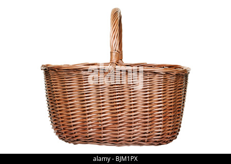 Traditional wicker shopping basket weaved from willow, isolated on a white background. Stock Photo