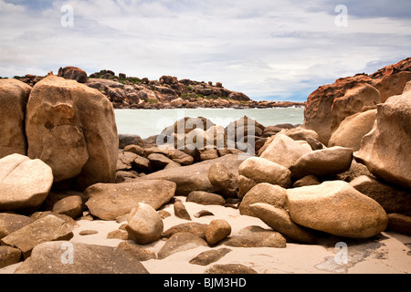 Rocks on beach, Bowen, Queensland, Australia Stock Photo