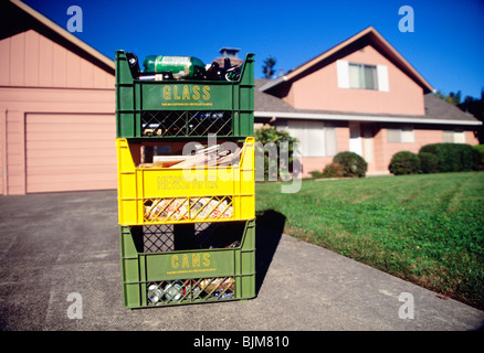 House Exterior with Recycling Bins in front of garage, USA  1999 Stock Photo