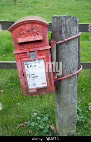 A rural letter box in need of a coat of paint Stock Photo