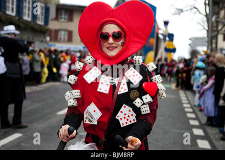 Guggenmusig Schaedubrommer group dressed to the theme of casino during the carnival procession in Malters, Lucerne, Switzerland Stock Photo