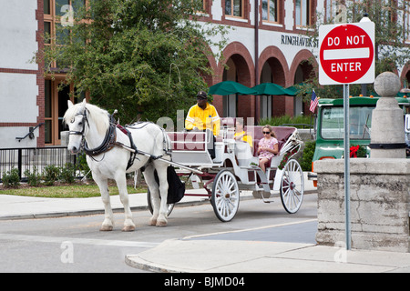 St. Augustine, FL - Jan 2009 - Tourists taking horse drawn guided tour in St. Augustine, Florida Stock Photo