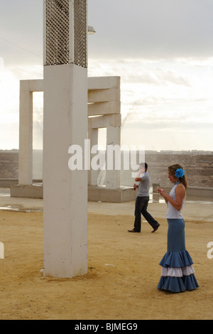 Young woman wearing traditional clothes, Chiclana, Spain Stock Photo