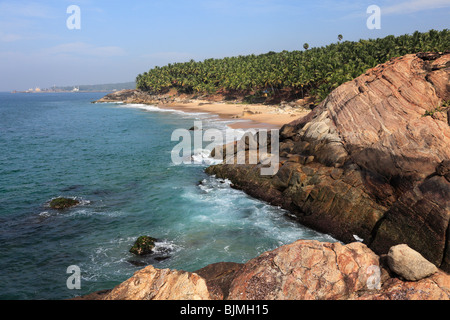 Rocky coast and sandy beach south of Vizhnijam, Malabarian Coast, Malabar, Kerala state, India, Asia Stock Photo