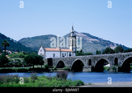 The Roman bridge at Ponte de Lima, in northern Portugal's Minho region, which leads to the town's church of Santo António. Stock Photo