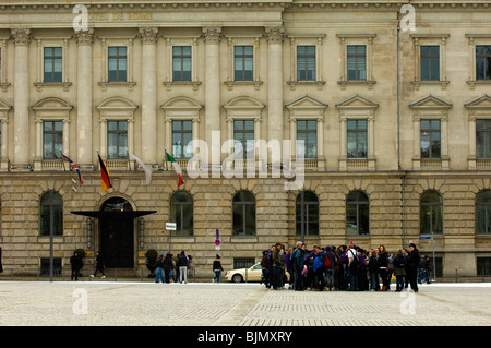 Tourists standing outside Hotel De Rome Bebelplatz Berlin Germany Stock Photo