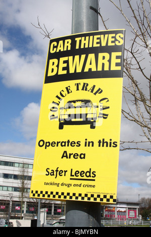 A Police Trap Car warning sign in a U.K. city. Stock Photo