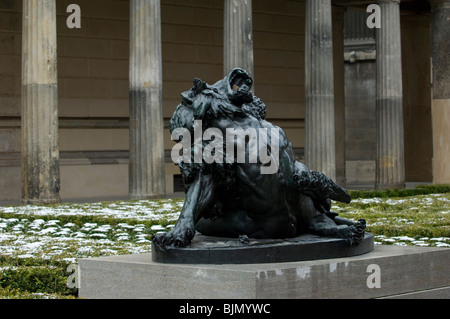 Berlin German statue of a man fighting with a beast outside Neues museum Stock Photo